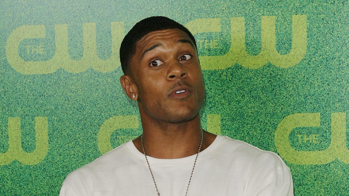 Marion "Pooch" Hall, right, was arrested in Burbank Wednesday night on suspicion of DUI and child endangerment. He's seen here in this photo from July 2006.