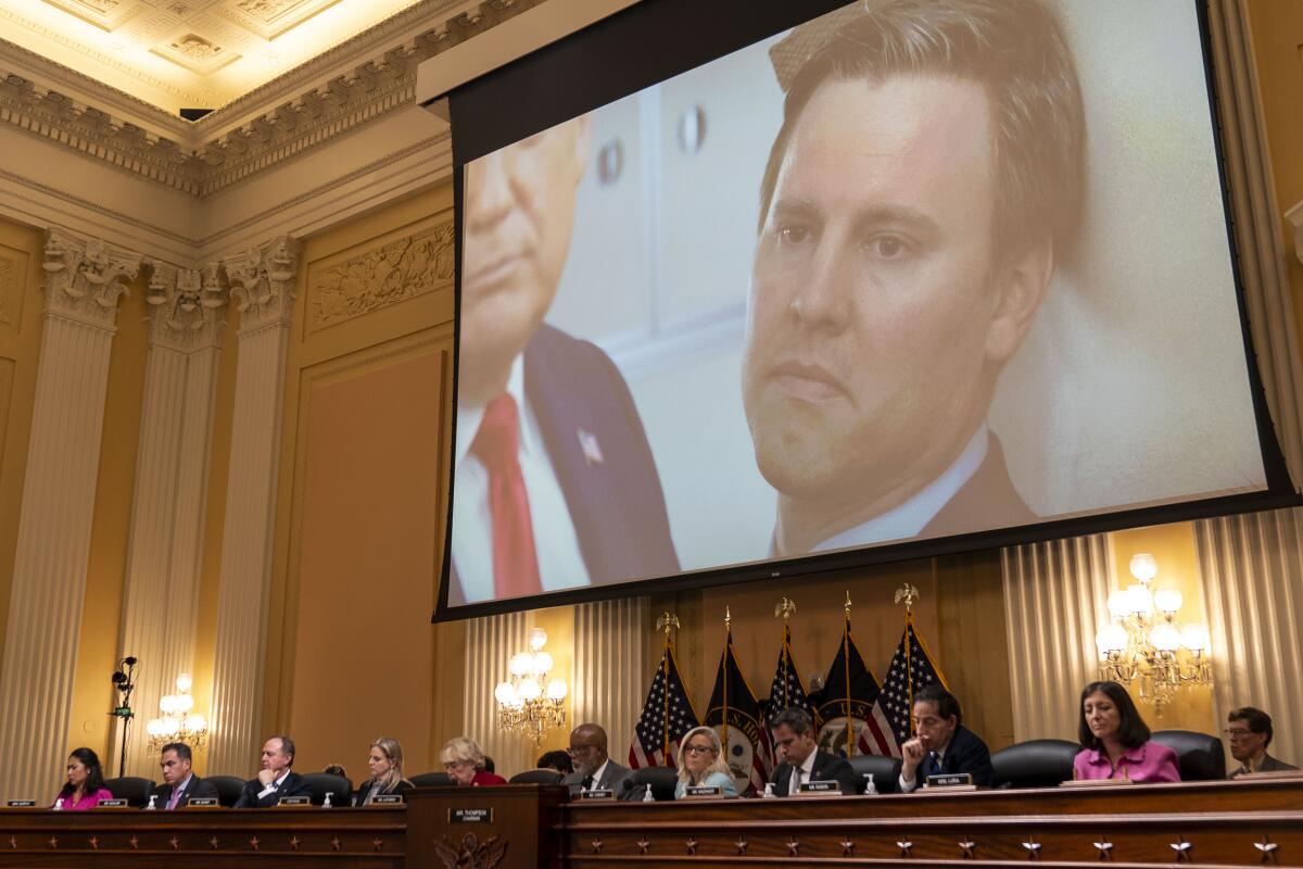 A photograph of Bill Stepien is seen on an overheard screen during the House Jan. 6 committee hearing on June 13.