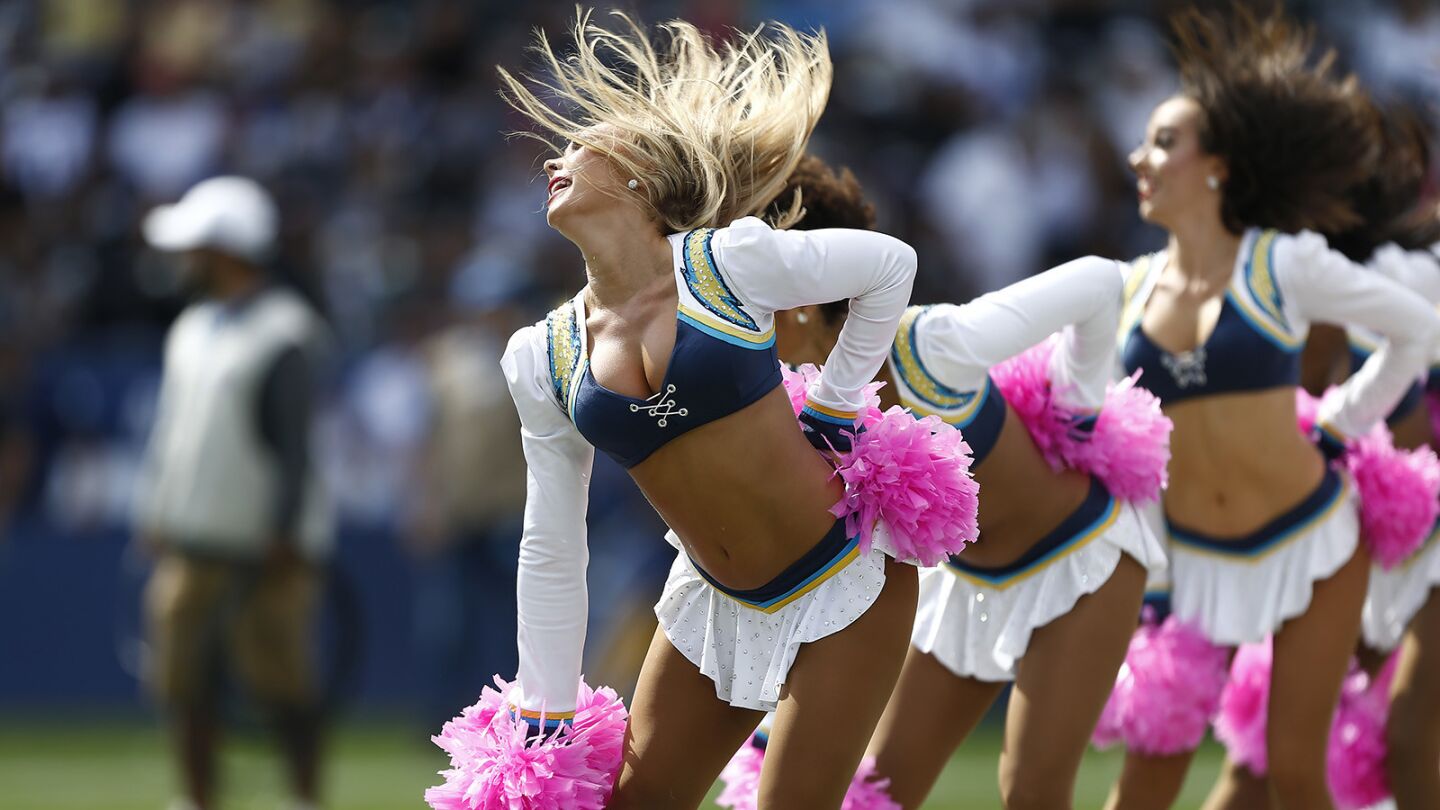 Los Angeles Chargers cheerleaders perform during a game against the Oakland Raiders at the StubHub Center in Carson on Oct. 7, 2018. (Photo by K.C. Alfred/San Diego Union-Tribune)