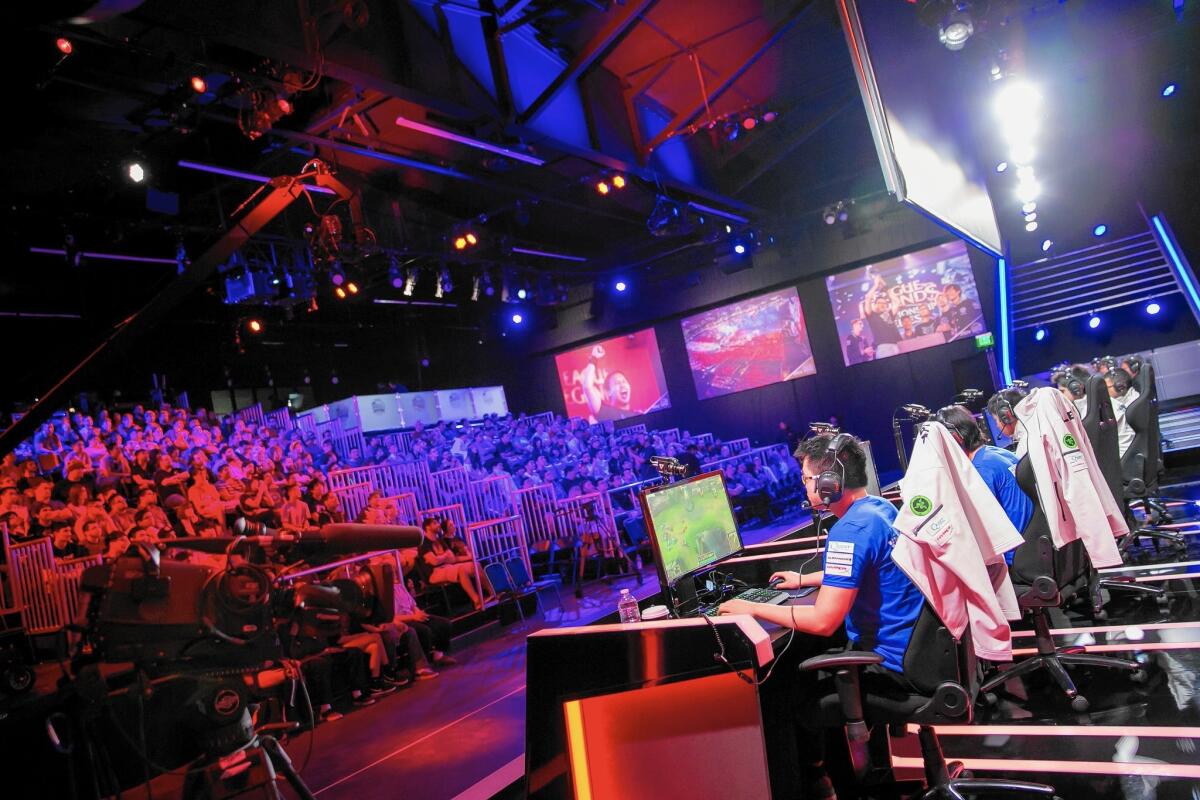 ESports programming on TBS in 2016 is set to feature a pair of 10-week seasons. Above, a video gaming competition at the Riot Games studio in L.A.
