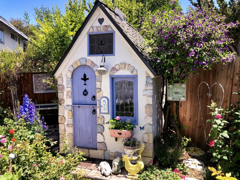 A homemade cottage playhouse.