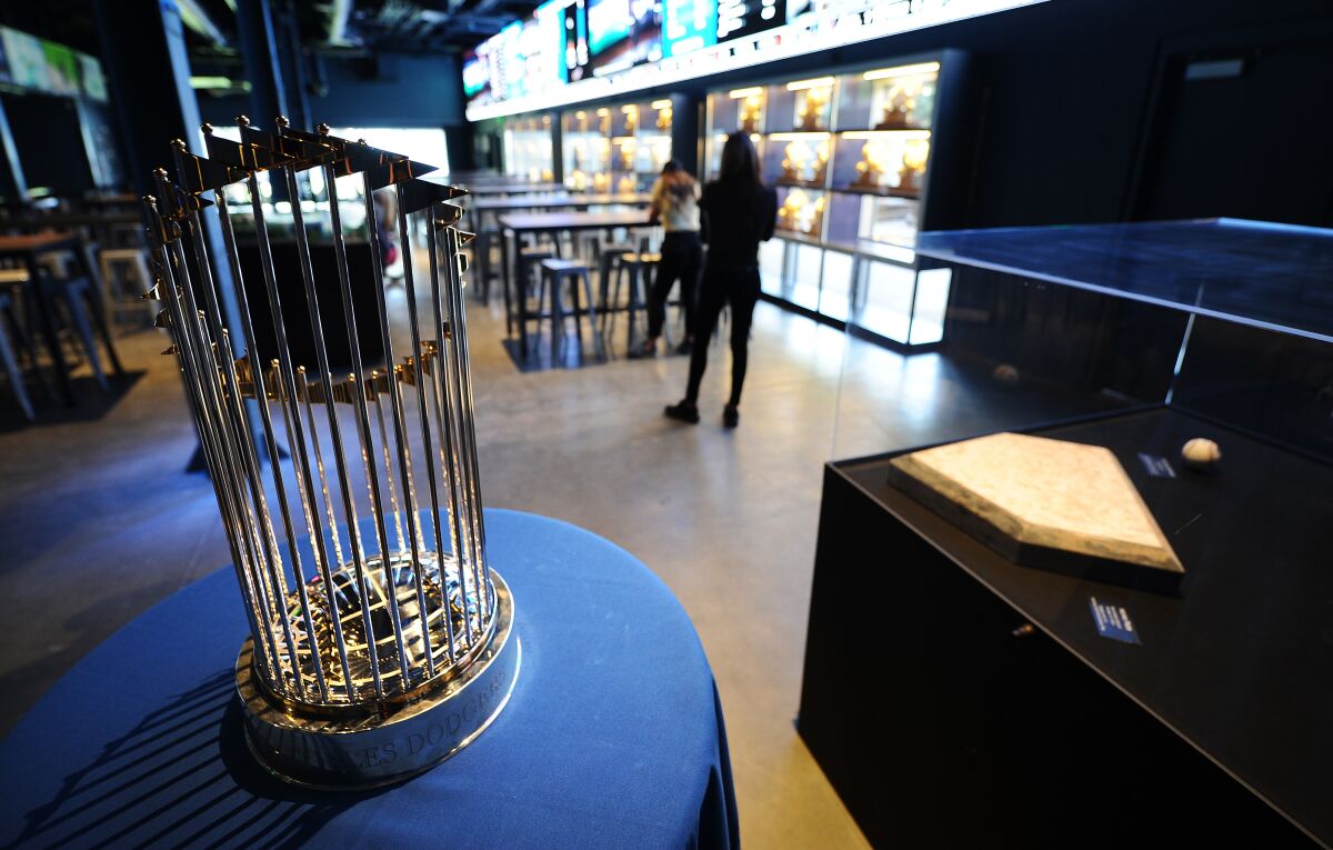 The 2020 World Series Championship trophy is on display in the Gold Glove Bar under the left field bleachers.
