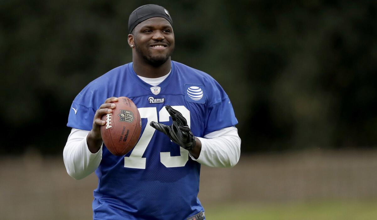 “Sometimes I don’t even feel like I’m holding, but they still call it because they’re looking for anything,” says Rams offensive tackle Greg Robinson, shown after a practice session at Pennyhill Park Hotel in Bagshot, England, on Oct. 20.