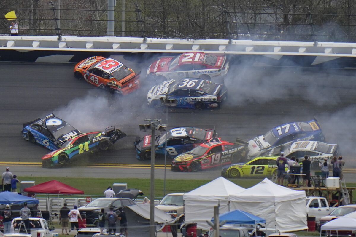Cars collide on the 14th lap of the Daytona 500 on Sunday.