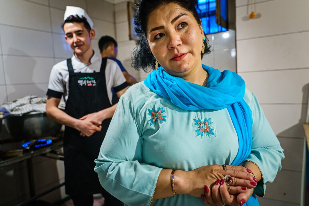 Laila Haidari with staff members of her cafe