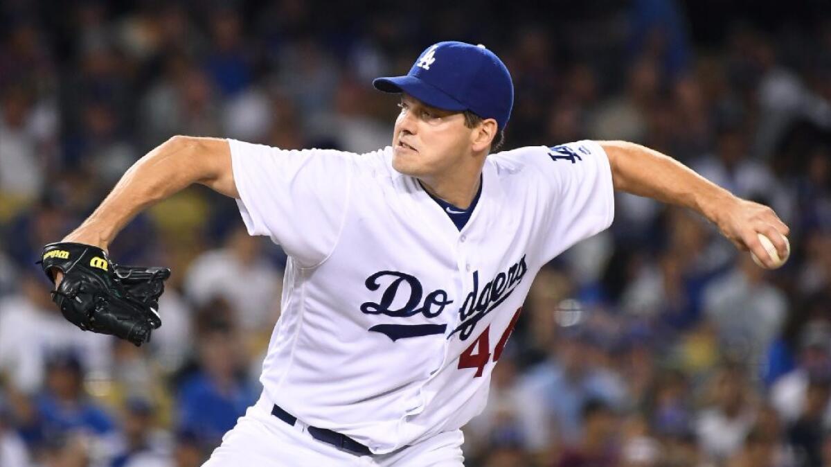 Dodgers left-hander Rich Hill pitches against the Giants during a game on Sept. 20.