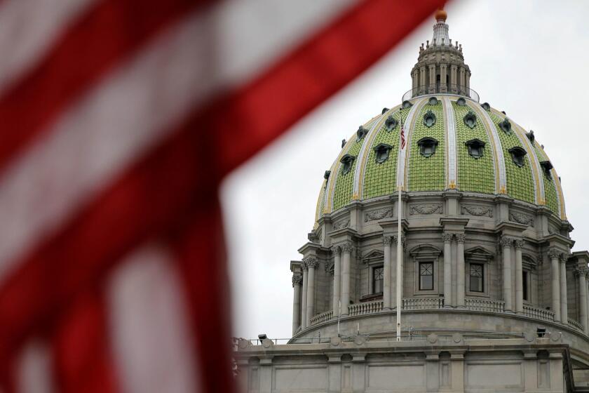 ADVANCE FOR USE SUNDAY, JUNE 25, 2017 AND THEREAFTER-FILE - This Wednesday, Oct. 7, 2015 file photo shows the Pennsylvania Capitol building in Harrisburg, Pa. An Associated Press analysis, using a new statistical method of calculating partisan advantage, finds traditional battlegrounds such as Michigan, North Carolina, Pennsylvania, Wisconsin, Florida and Virginia were among those with significant Republican advantages in their U.S. or state House races in 2016. (AP Photo/Matt Rourke)