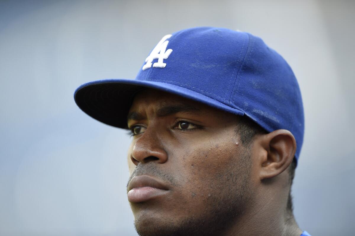 Dodgers outfielder Yasiel Puig looks on before a game against the Washington Nationals on July 19.