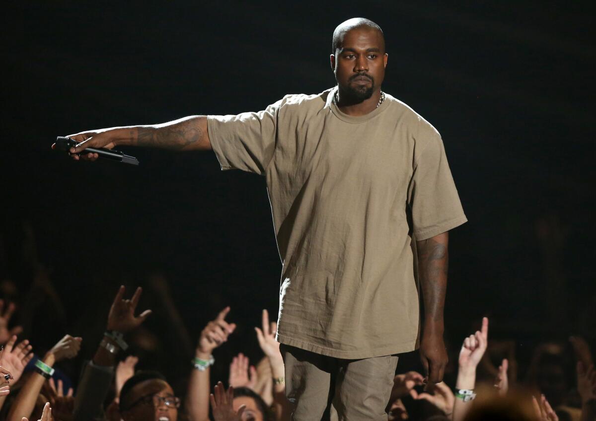 Kanye West accepts the Video Vanguard Award on Sunday at the MTV Video Music Awards at the Microsoft Theater in Los Angeles.
