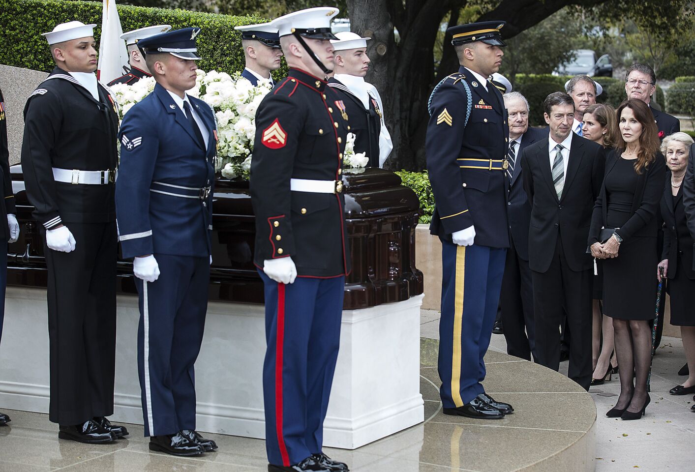 A military honor guard places Nancy Reagan's casket at her gravesite at the Ronald Reagan Presidential Library in Simi Valley.