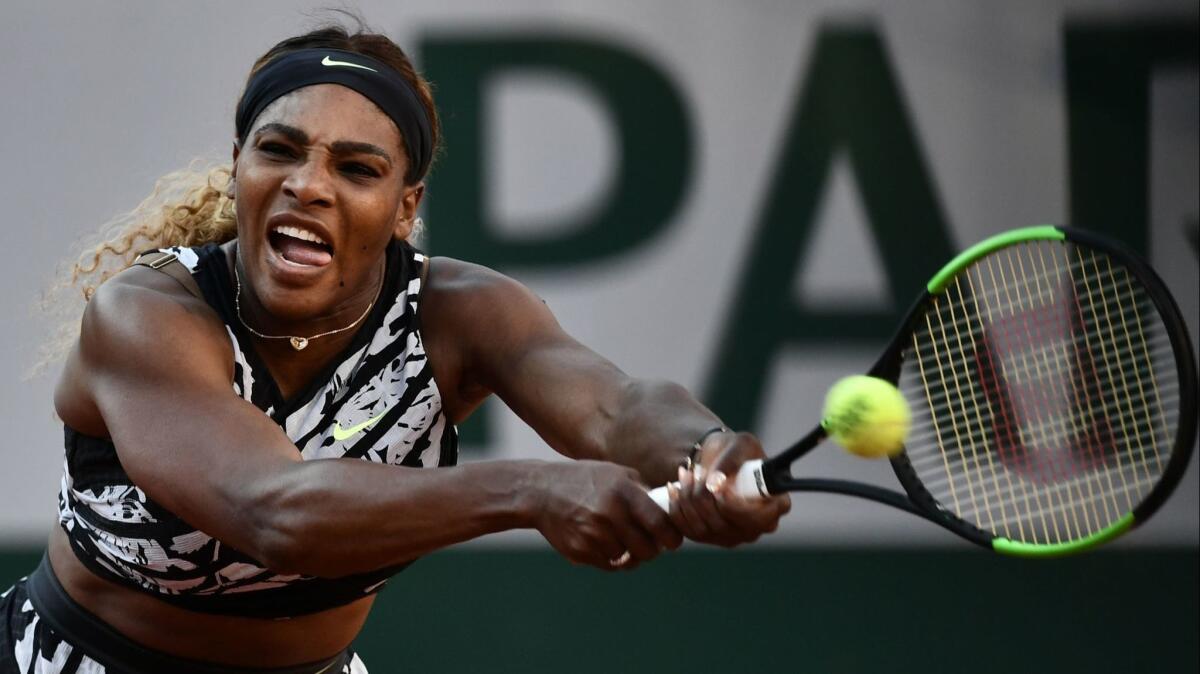 Serena Williams hits a return during her loss to Sofia Kenin during the third round of the French Open on June 1.