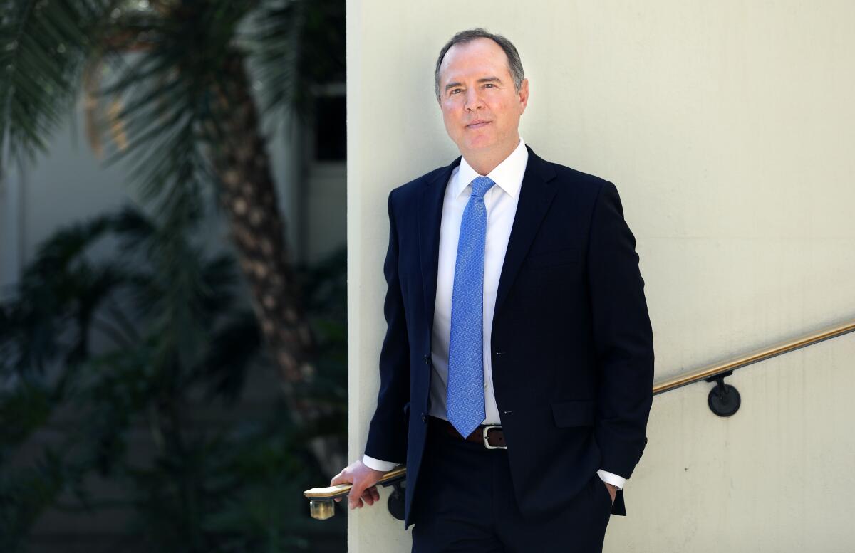 Adam Schiff stands outside of Burbank City Hall