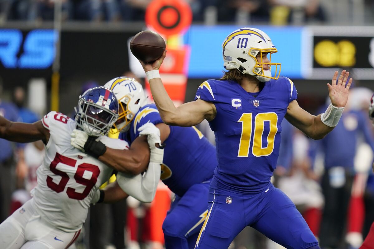 Los Angeles Chargers quarterback Justin Herbert throws against the New York Giants during Sunday's game.