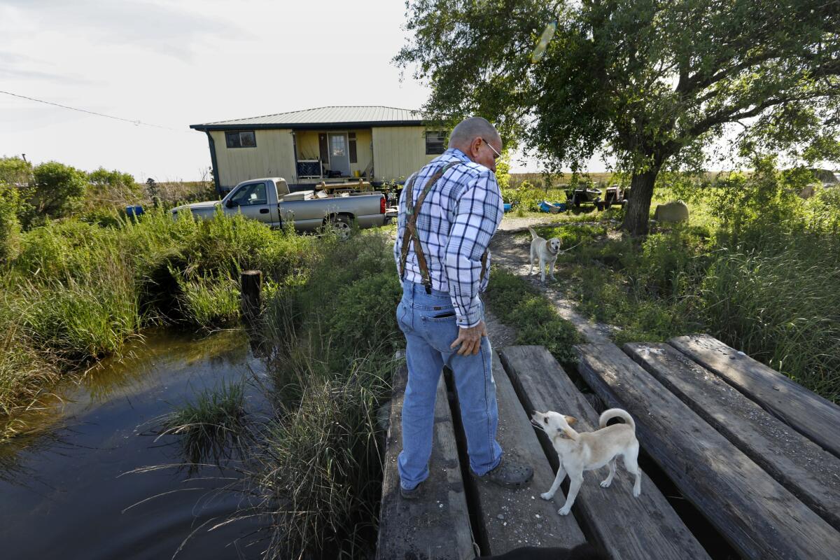 Johnny Tamplet, a retired carpenter, still lives on the Isle de Jean Charles, although he is not of Native American descent. (Carolyn Cole / Los Angeles Times)