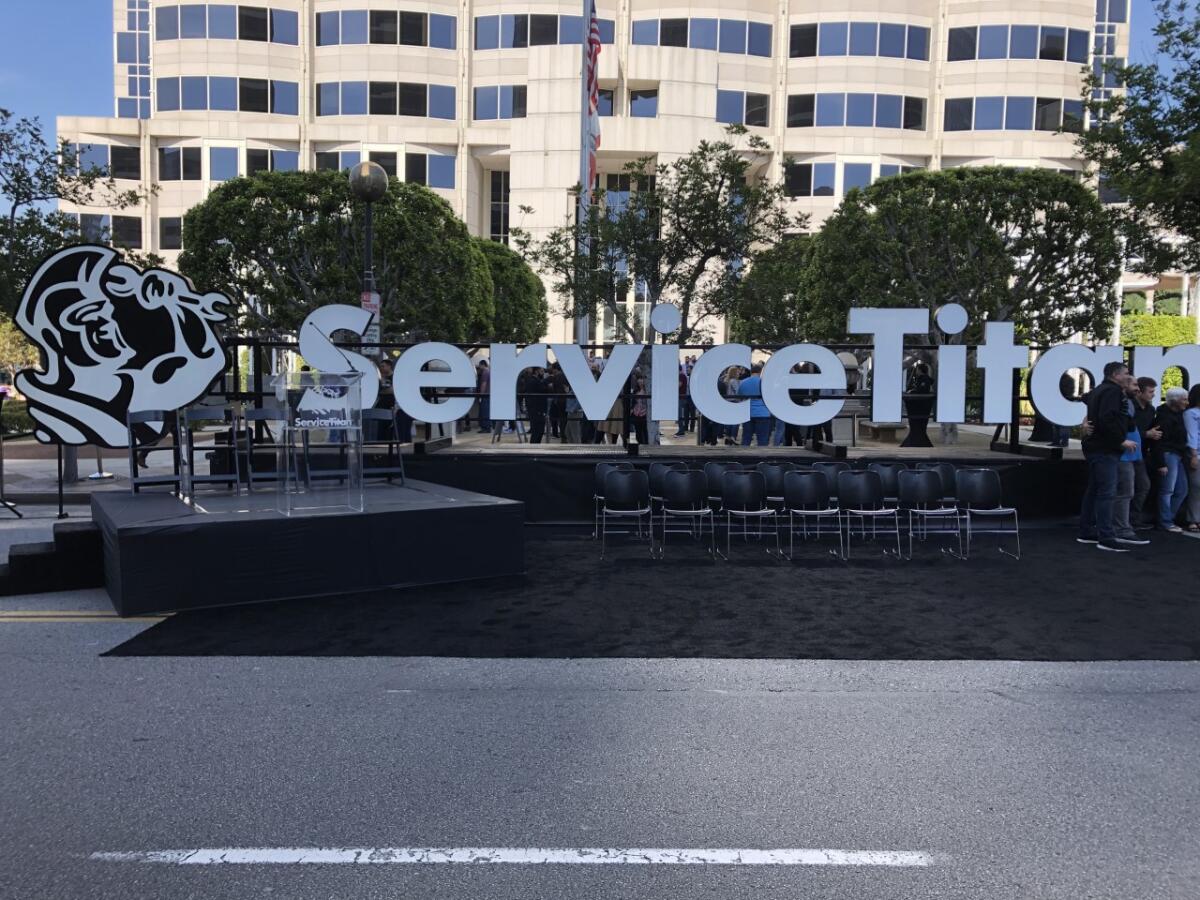 ServiceTitan, a Glendale-grown tech "unicorn," this week celebrated the installation of two signs bearing its logo across the top of its new Glendale headquarters at 800 N. Brand Blvd. The photo above is of one of the signs before it was put in place above the building. With ServiceTitan valued at more than $1.65 billion, its top brass sees the signs as a symbolic milestone of the company's progress.