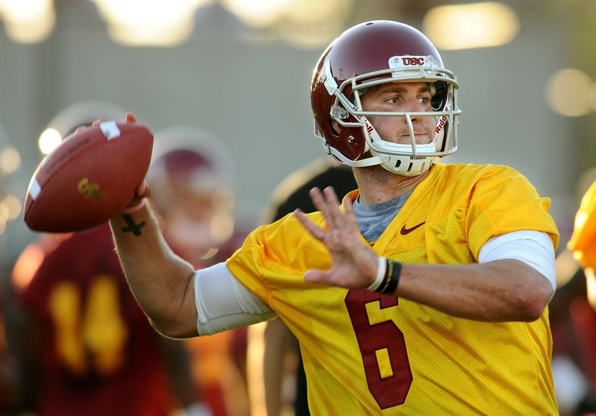 USC quarterback Cody Kessler throws a pass during a practice on Aug. 4.