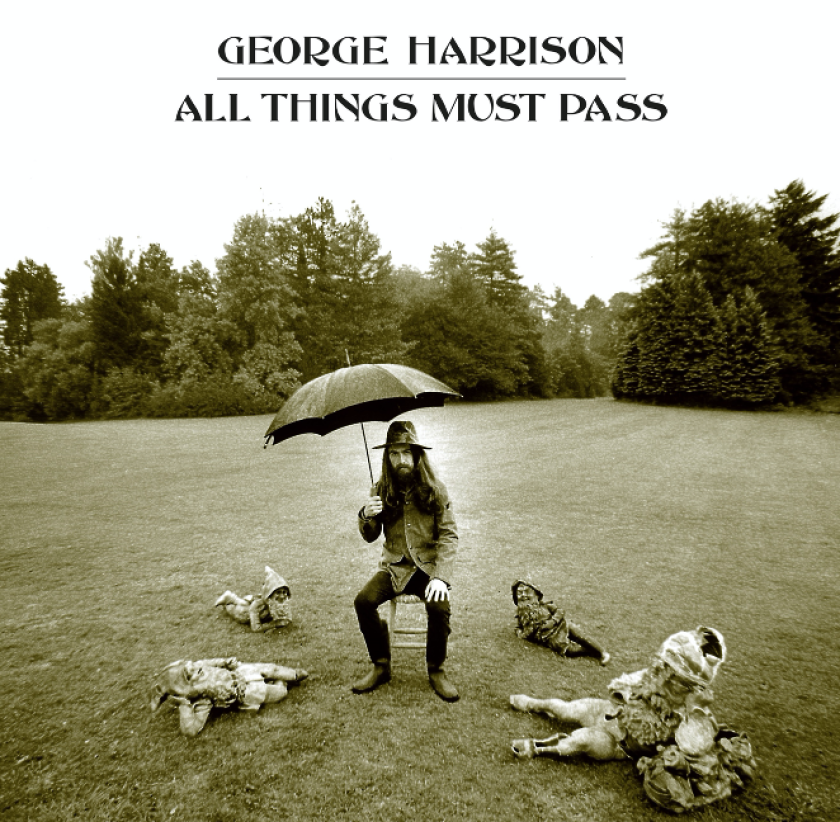  Cover art for George Harrison's All Things Must Pass shows a man holding an umbrella with garden gnomes on the ground