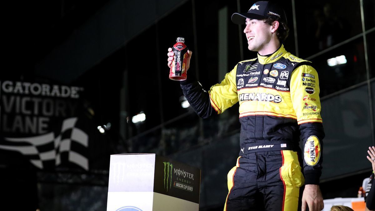 Ryan Blaney celebrates in Victory Lane after winning the Monster Energy NASCAR Cup Series Can-Am Duel 1 at Daytona International Speedway on Wednesday.