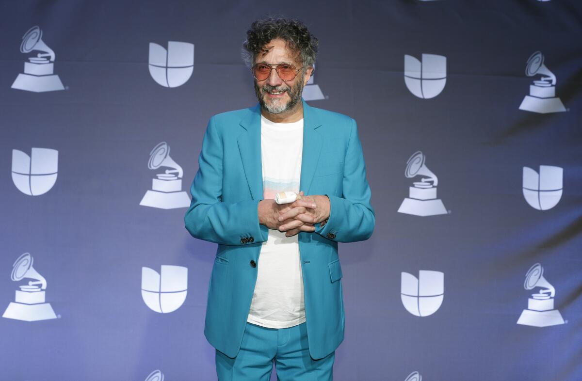 FILE - Argentine rockstar Fito Paez poses in the press room at the 20th Latin Grammy Awards in Las Vegas on Nov. 14, 2019. Paez is nominated for a Grammy for Best Latin Rock or Alternative Album for “La Conquista del Espacio.” (Photo by Eric Jamison/Invision/AP, File)