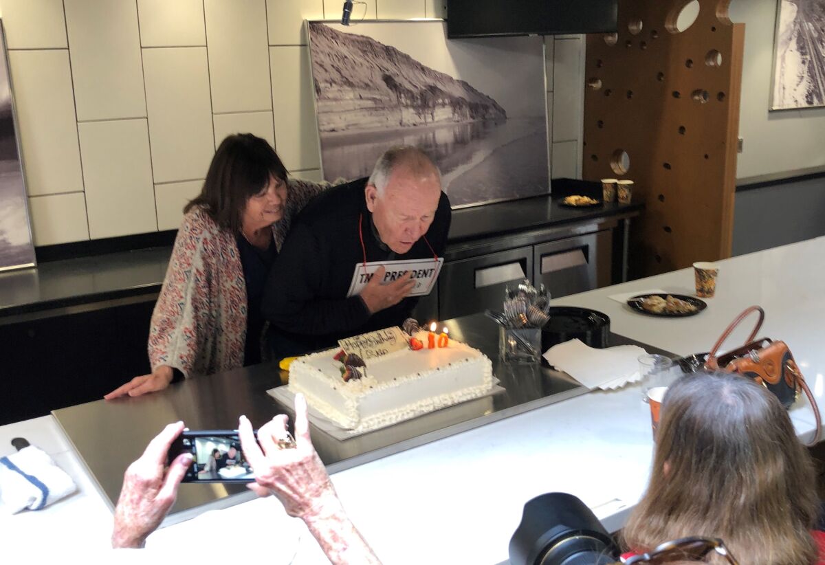 Skip Stratton, with his wife Tracey, blew out the candles at his 80th birthday party.