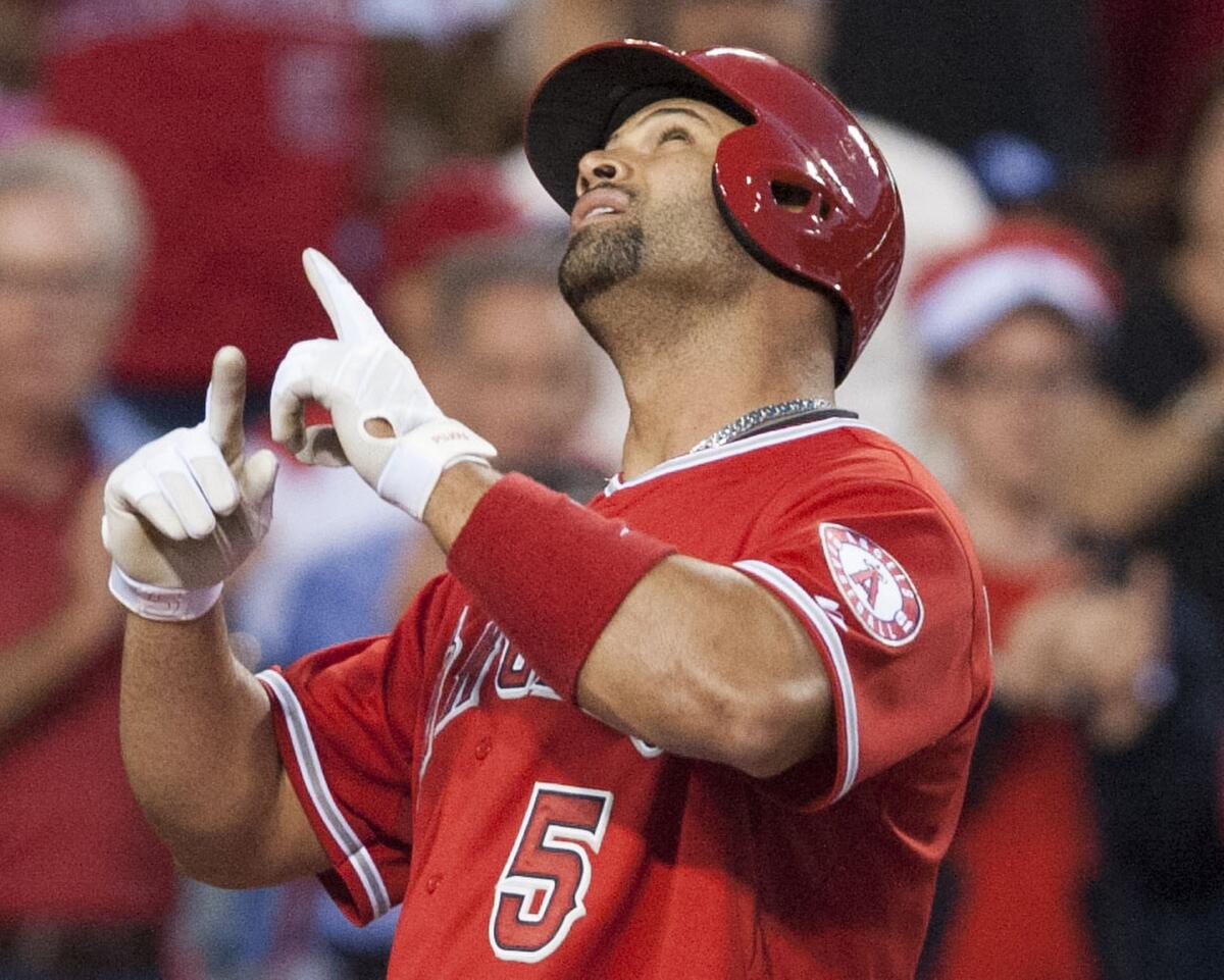 Angels slugger Albert Pujols celebrates a solo home run against Chris Archer in the fourth inning. It was the Angels only run in a 6-1 loss to the Rays.