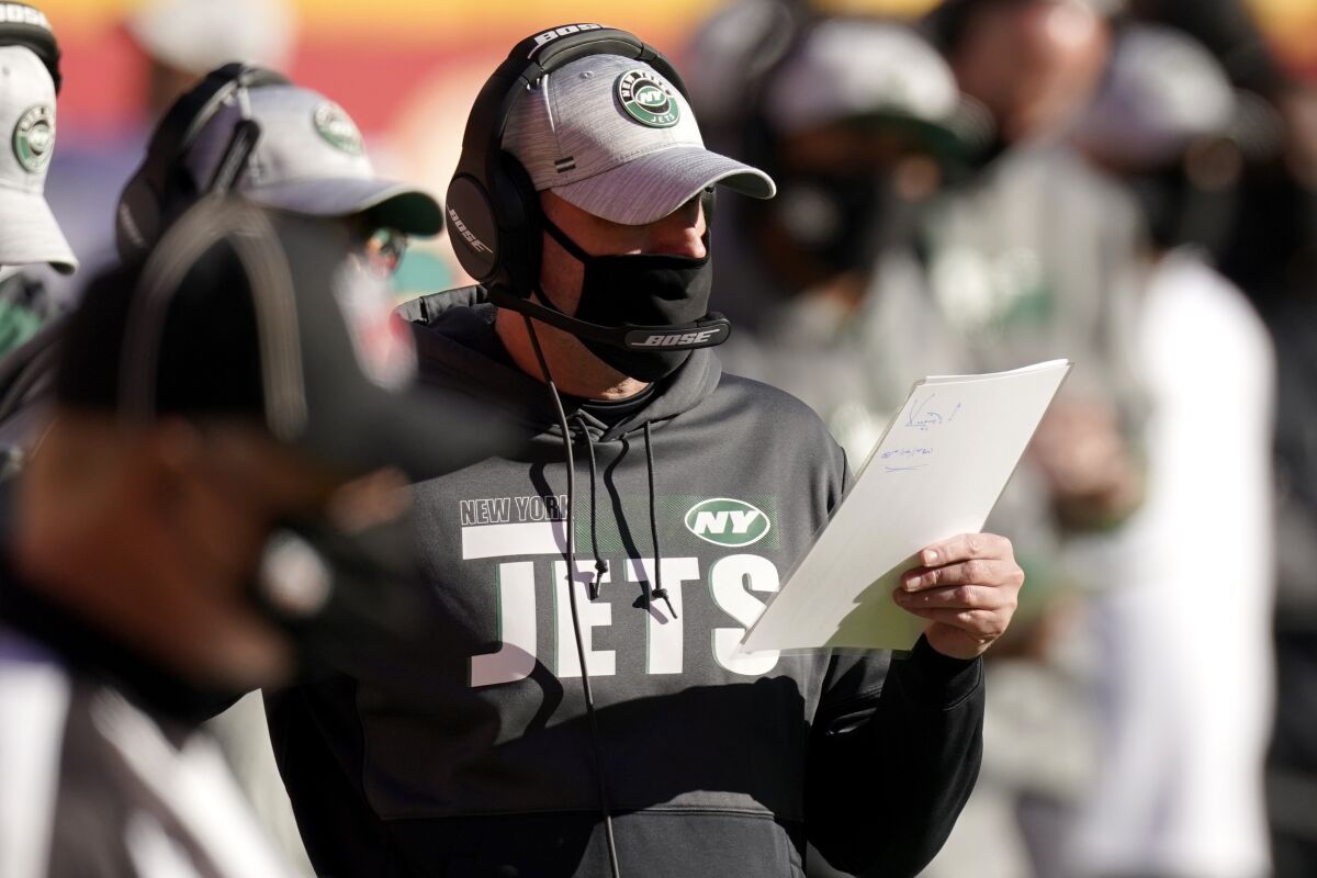 New York Jets head coach Adam Gase watches play against the Kansas City Chiefs in the second half of an NFL football game on Sunday, Nov. 1, 2020, in Kansas City, Mo. (AP Photo/Charlie Riedel)