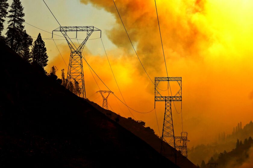 Carolyn Cole  Los Angeles Times THE CAMP FIRE burns near Pulga, Calif. A Wall Street Journal story linked the blaze to maintenance delays on PG&E power lines.