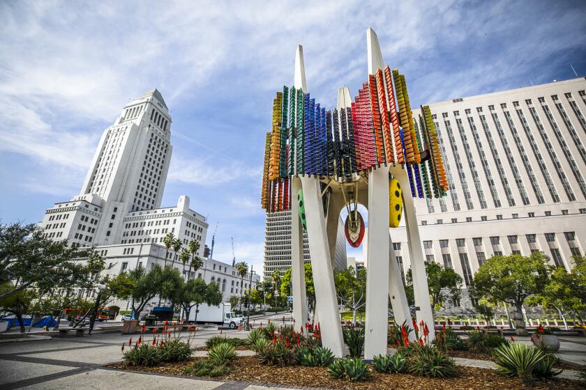 LOS ANGELES, CA - JANUARY 13: The Triforium was installed in 1975 in the shadow of City Hall. Artist Joseph L. YoungOs 60-foot tall sculpture featured nearly 1500 multicolored Venetian glass prisms and a 79-note glass-bell electronic carillon. The 1970s turned 50 in 2020. The LA Conservancy, whose mission is to preserve the historic places that make L.A. County unique, is celebrating with a self-driving tour N ORolling through the O70s: A Weekend in Los Angeles.O Photographed at Fletcher Bowron Square on Wednesday, Jan. 13, 2021 in Los Angeles, CA. (Myung J. Chun / Los Angeles Times)