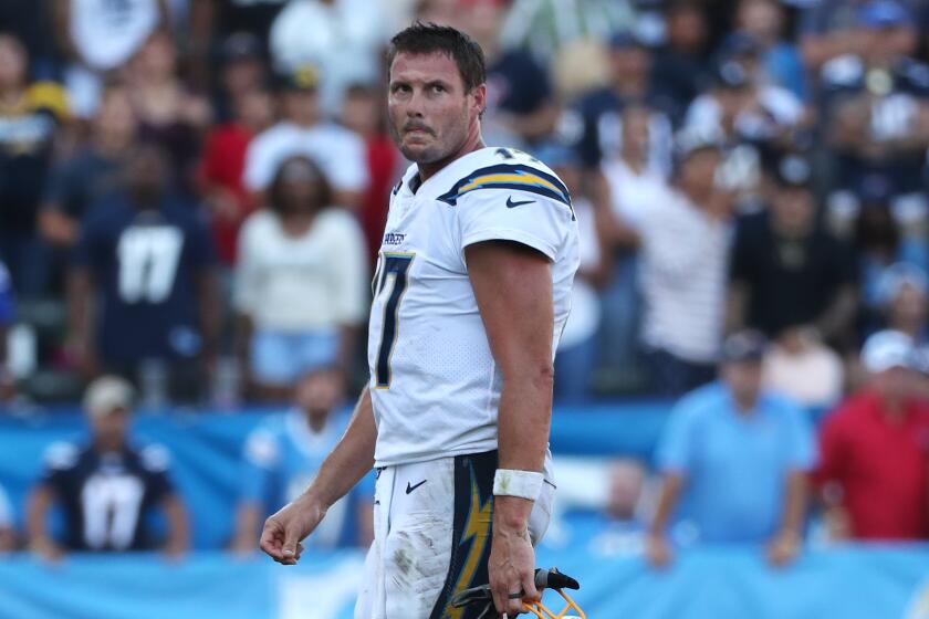 CARSON, CA - SEPTEMBER 22, 2019: Los Angeles Chargers quarterback Philip Rivers (17) walks off the field in the final moments of the Chargers 27-20 loss to the Houston Texans at Dignity Health Sports Park on September 22, 2019 in Carson, California. (Gina Ferazzi/Los AngelesTimes)
