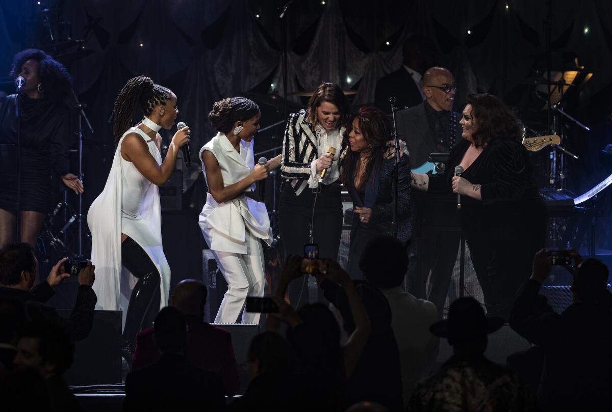 Chole x Halle, left, are joined by Brandi Carlile, Valerie Simpson and Keala Settle.