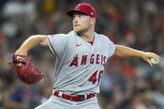 Los Angeles Angels starting pitcher Reid Detmers delivers during the first inning of the team's baseball game.