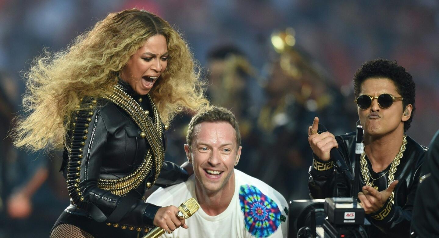 Beyonce, Chris Martin and Bruno Mars perform during Super Bowl 50 between the Carolina Panthers and the Denver Broncos. TIMOTHY A. CLARY/AFP/Getty Image