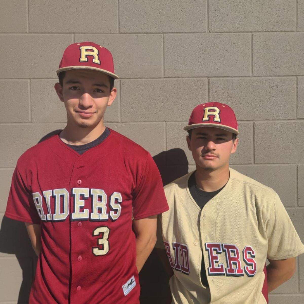 The Roosevelt duo of pitcher Lino Zepeda (left) and catcher Matias Nolasco.
