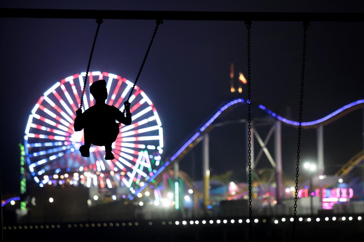 SANTA MONICA, CALIFORNIA-The Pacific Park Ferris wheel at the Santa Monica Pier is illuminated with red, white and blue. (Wally Skalij/Los Angeles Times)