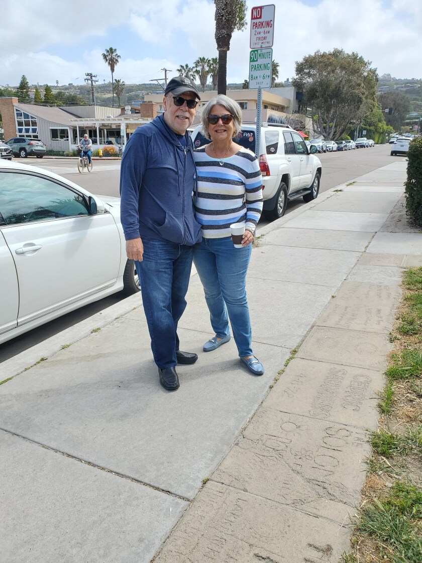 Norman and Judith Solomon stand in front of their concrete slab at Laureate Park in La Jolla Shores.