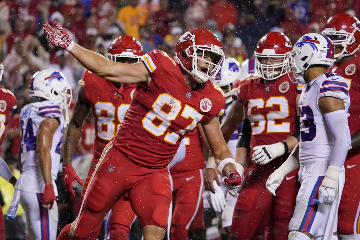 Kansas City Chiefs tight end Travis Kelce celebrates after scoring during the second half of an NFL football game against the Buffalo Bills Sunday, Oct. 10, 2021, in Kansas City, Mo. (AP Photo/Ed Zurga)