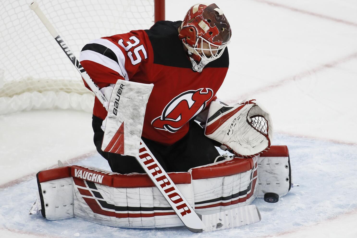 Adam Henrique re-signs with Devils on multiyear deal 