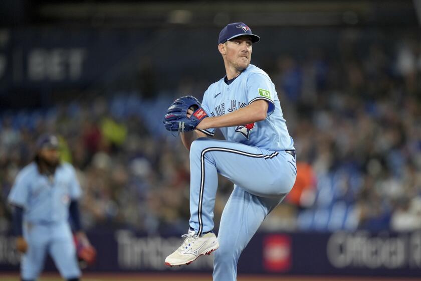 Toronto Blue Jays starting pitcher Chris Bassitt winds up during the first inning of the team's baseball game against the New York Yankees on Thursday, Sept. 28, 2023, in Toronto. (Chris Young/The Canadian Press via AP)