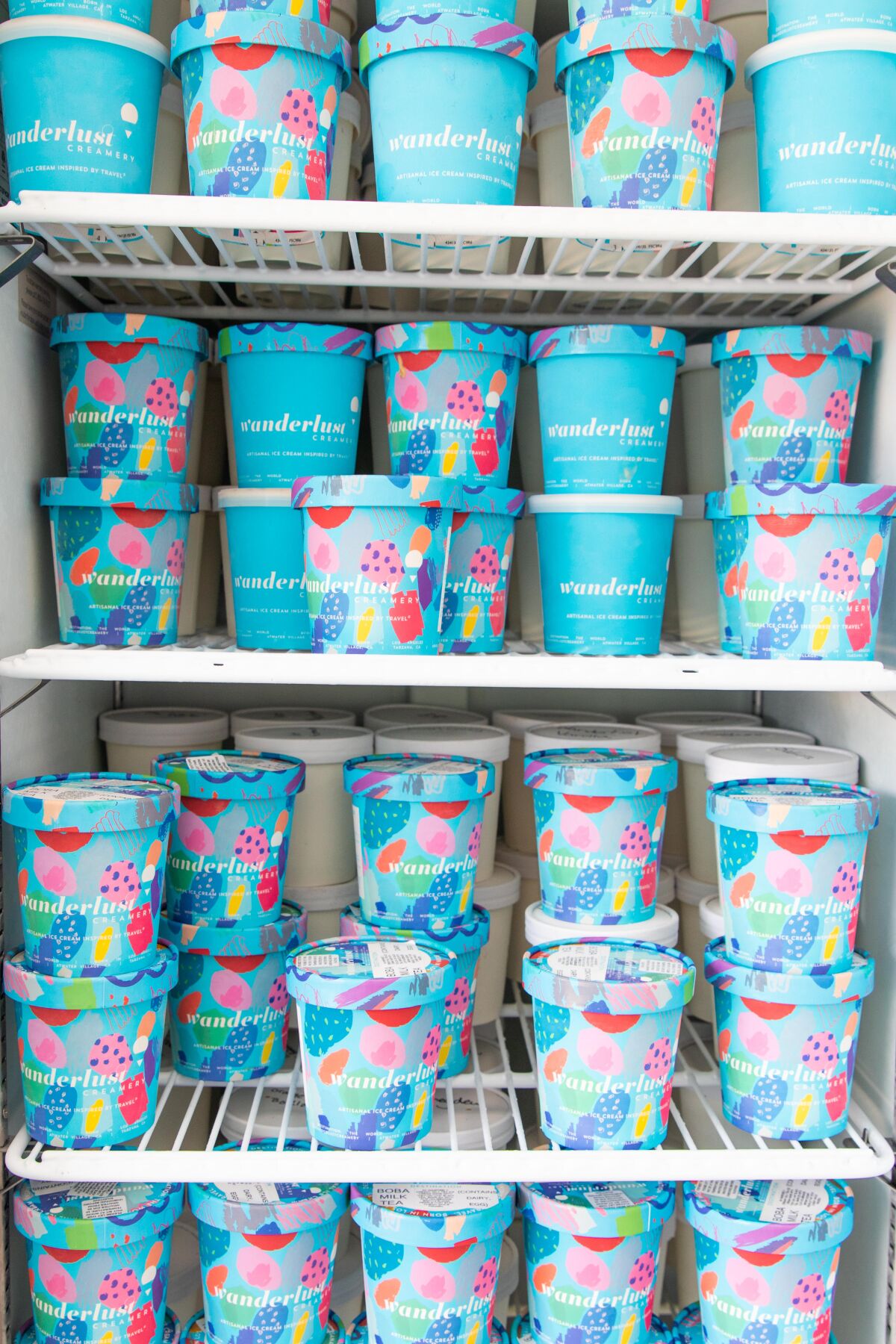 Wanderlust Creamery products inside a refrigerator.