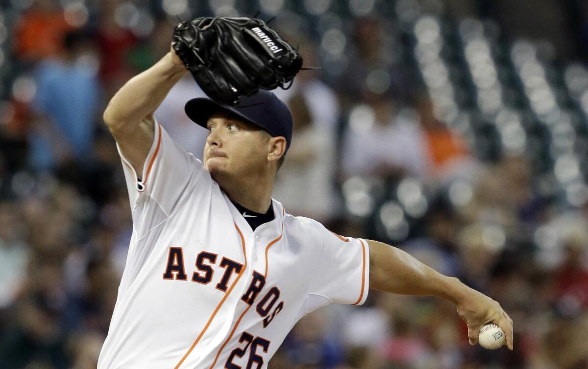 Astros left-hander Scott Kazmir delivers a pitch against the Angels in the first inning.
