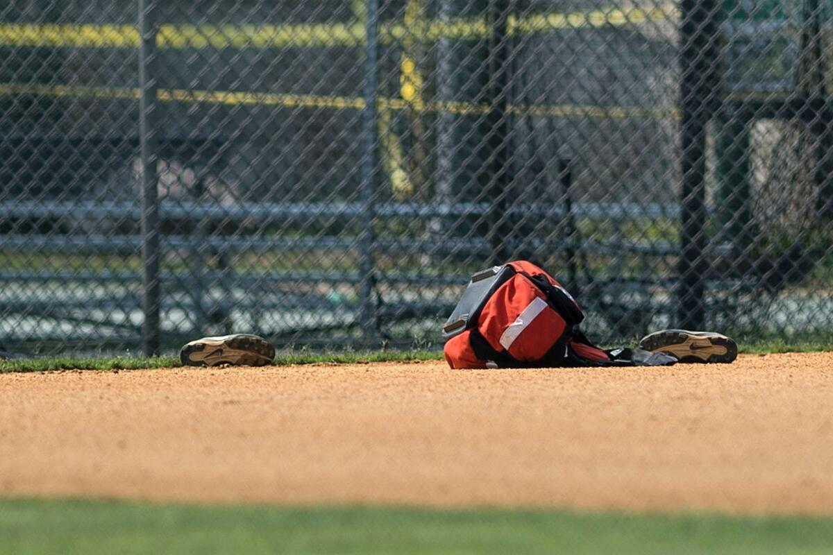 Baseball equipment on a field.