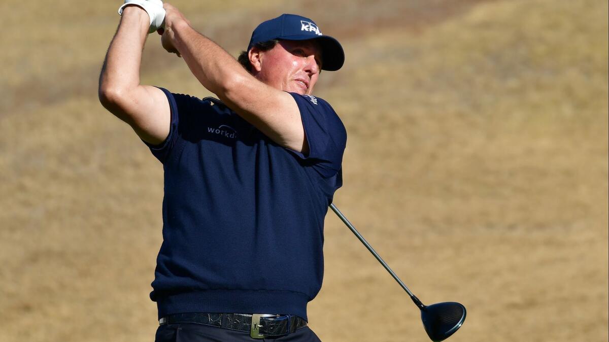 Phil Mickelson, playing on No. 8 at the Stadium Course on Saturday during the third round of the Desert Classic, managed to remain in the lead despite some wild shots.