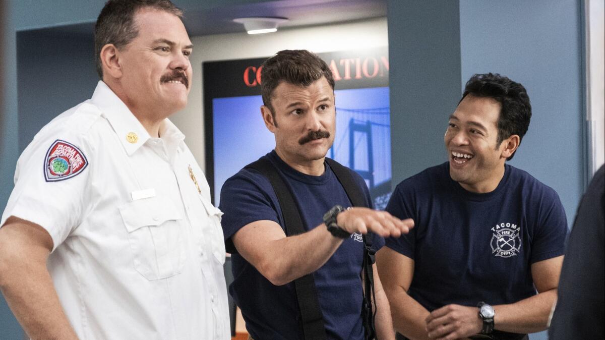 Kevin Heffernan, left, Steve Lemme and Eugene Cordero in a scene from "Tacoma FD."