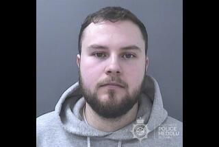 This undated handout photo provided by South Wales Police shows Lewis Edwards. Edwards, a former British police officer, has been sentenced to life in prison with a minimum term of 12 years after he pleaded guilty to over 100 child sex offenses. The crimes included threatening and blackmailing more than 200 young girls into sending him sexual photos of themselves on Snapchat. (South Wales Police via AP)