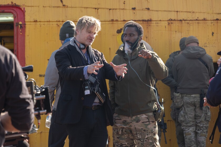 Le réalisateur Christopher Nolan et l'acteur John David Washington.