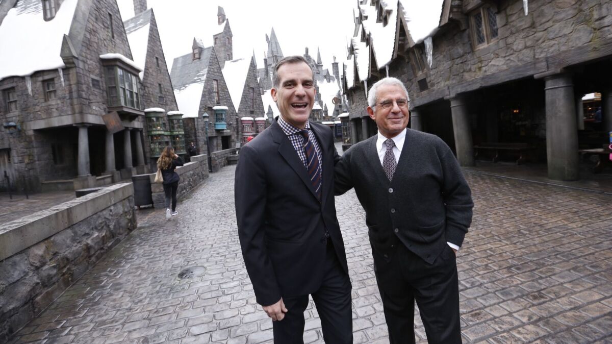 Mayor Eric Garcetti with Ron Meyer, vice chairman of NBCUniversal, at Universal Studios Hollywood on Wednesday before a news conference where Garcetti announced that L.A. County hosted 47.3 million visitors in 2016, a new record and 4% increase over the previous year.