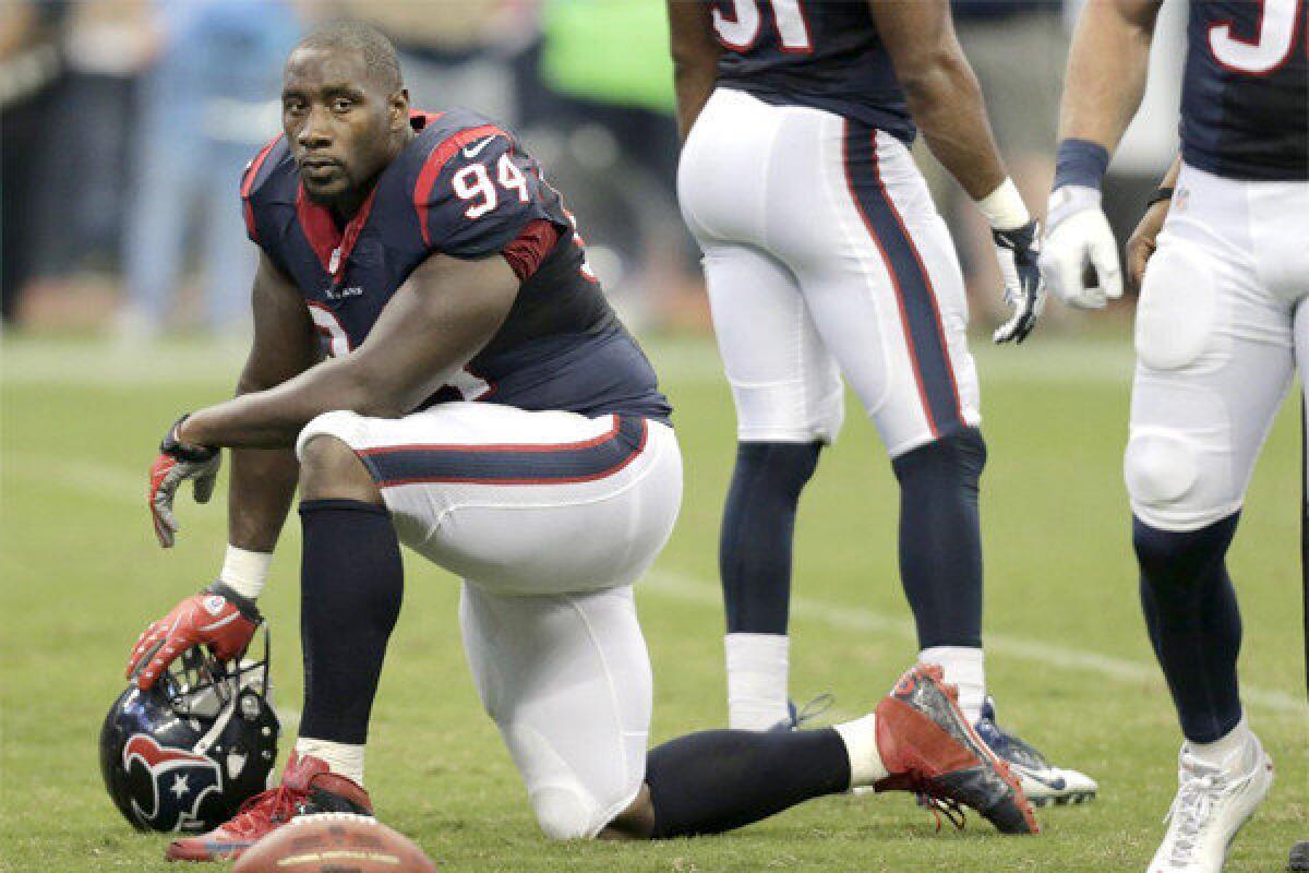 Texans defensive end Antonio Smith was suspended for Houston's remaining preseason games and the first game of the season for ripping the helmet of Miami Dolphins linebacker Richie Incognito and hitting him with it.