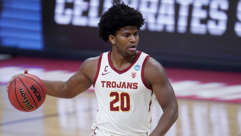 USC guard Ethan Anderson controls the ball against Drake on March 20.