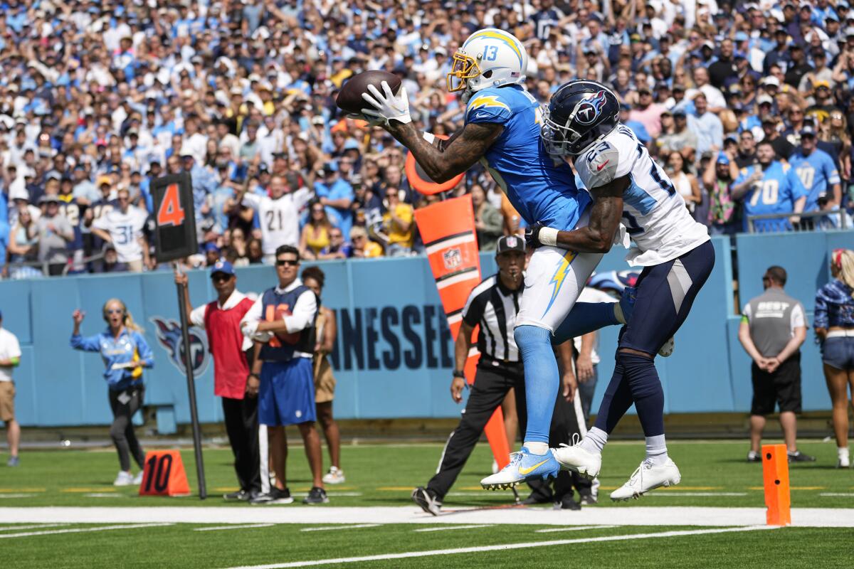Chargers wide receiver Keenan Allen makes a touchdown catch in front of Tennessee Titans cornerback Tre Avery.