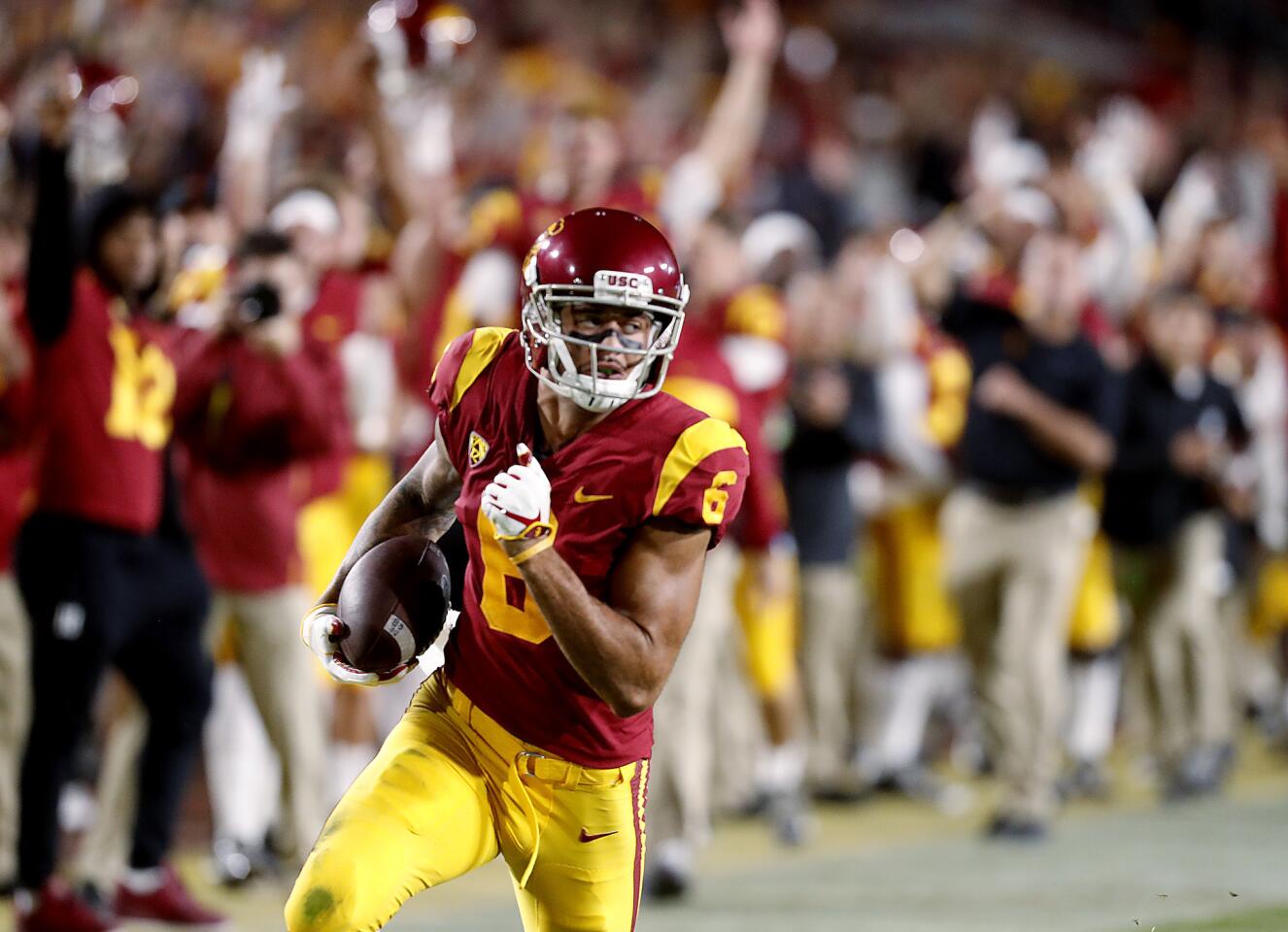 USC wide receiver Michael Pittman heads to the end zone for his first touchdown of the second quarter against Colorado on Saturday night at the Coliseum.